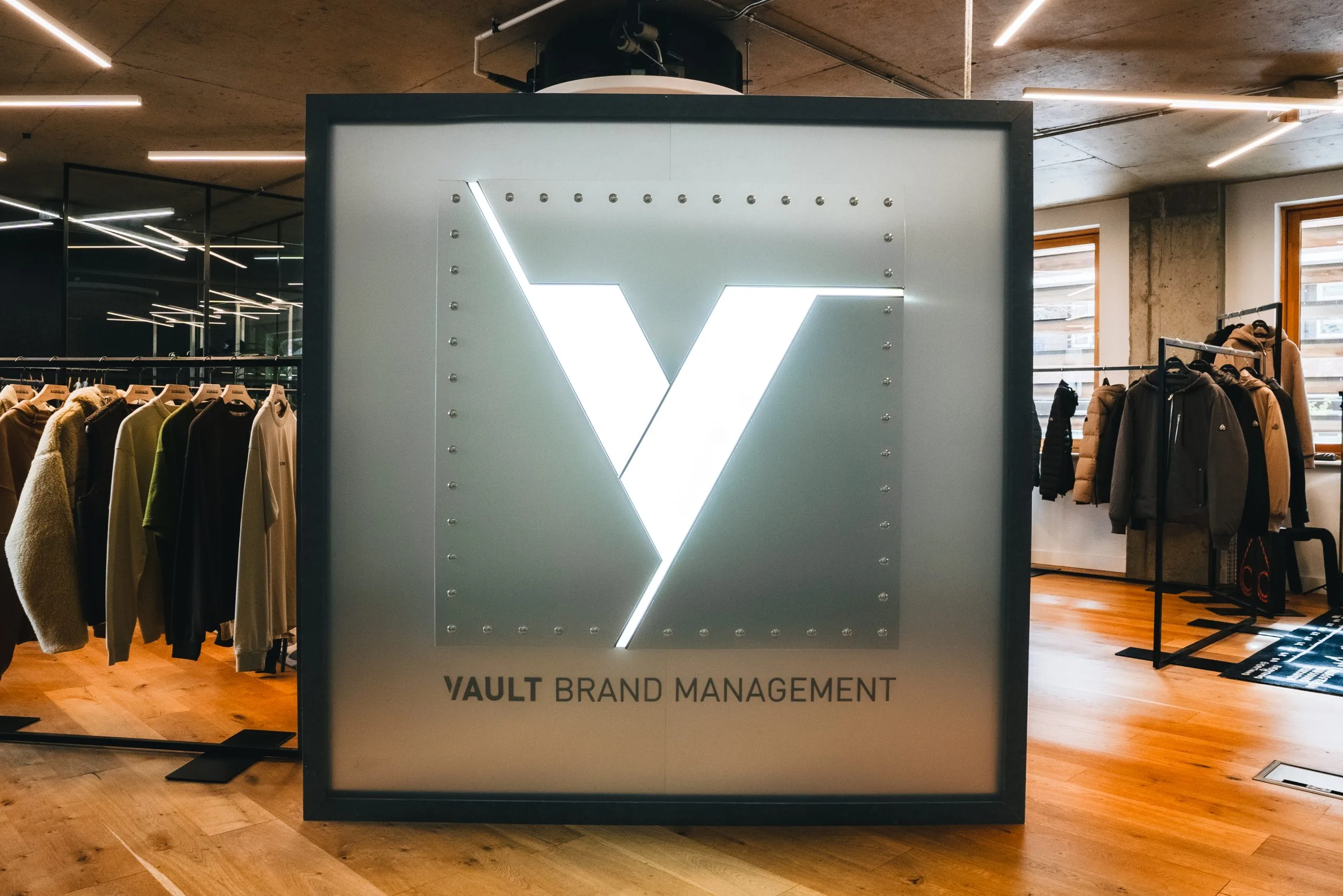 The Vault showroom in London with the illuminated V sign